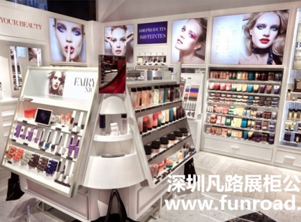 歐式不銹鋼玻璃化妝品展示柜臺陳列效果圖