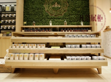 定制高端木質展柜，擺放精油類型產品的實拍