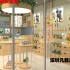 客戶化妝品店實木化妝品柜臺訂制展示效果圖