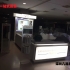 木質烤漆帶玻璃化妝品柜臺展示效果圖