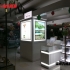 木質烤漆帶玻璃化妝品柜臺展示效果圖