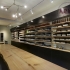 黑色高端木質烤漆，化妝品展柜柜臺定制展現效果